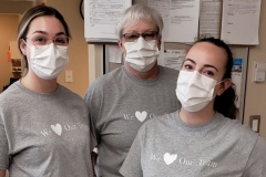 UHEW members wearing their shirts to support their bargaining team